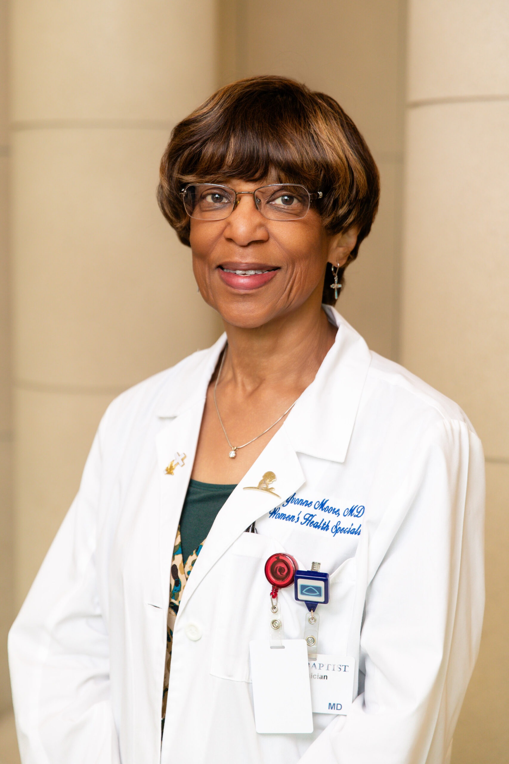 Physician portrait, white coat — gynecologist Memphis TN